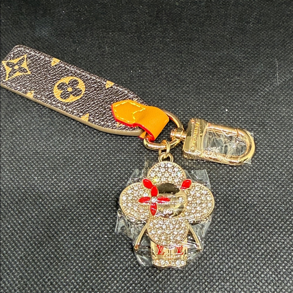 ❌ SOLD ❌ ✅ PRICE IS FIRM ✅ FASHION Strap Key Charm Gold Hardware and Red Accents